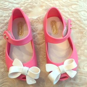 Pink with white bow EUC mini Melissa size 6